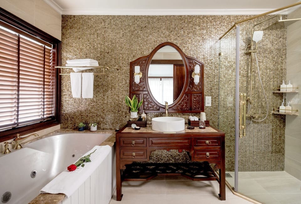 Junior Suite, 1 Bedroom, Ocean View | Bathroom | Separate tub and shower, hair dryer, bathrobes, slippers