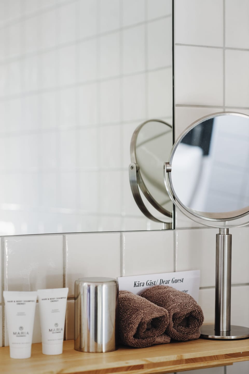 Shower, designer toiletries, hair dryer, towels