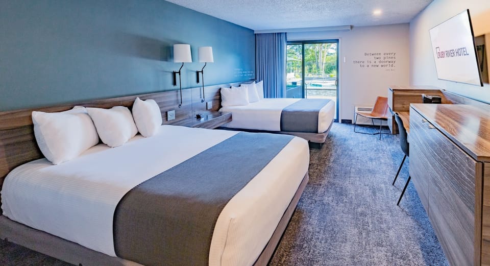 Double Queen - Riverside | Premium bedding, desk, laptop workspace, blackout drapes
