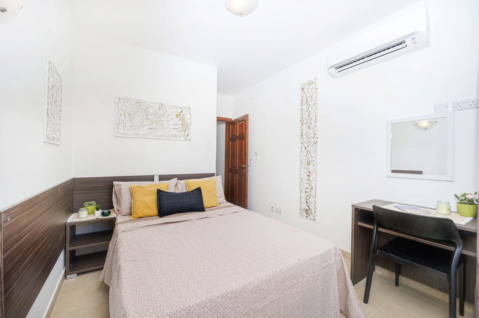 Main bedroom with double bed and balcony 