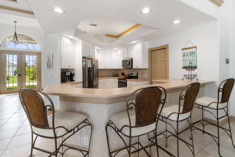 Watch the chef at work and say hello to dinner guests without leaving you stool.