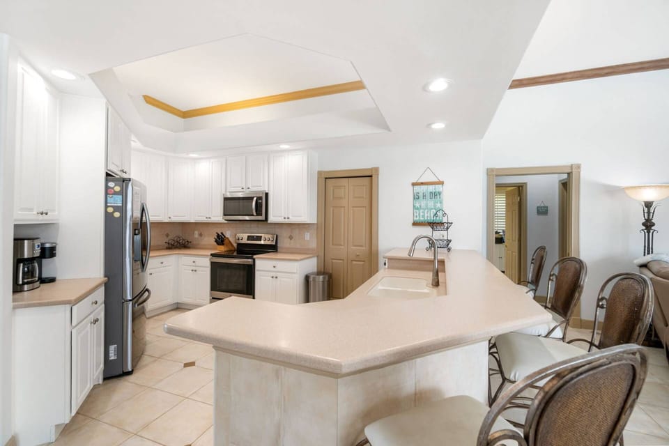 The kitchen is fully equipped and ready for any cooking or cocktailing endeavor.