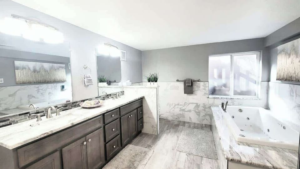 Air Jet Tub to enjoy after a long day of exploration with dual sinks
