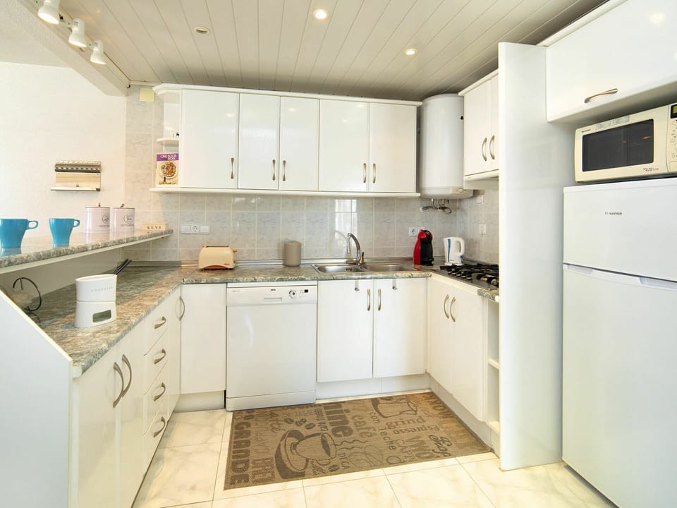 Property, Room, Kitchen, Furniture, Interior Design, Cabinetry, Building, House, Real Estate, Architecture