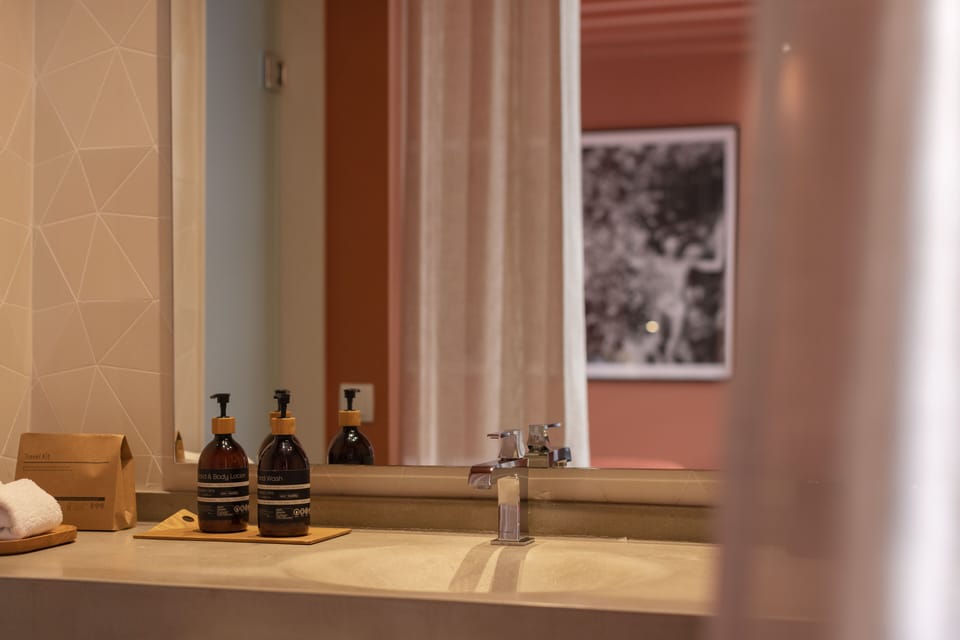 Rainfall showerhead, designer toiletries, hair dryer, bathrobes