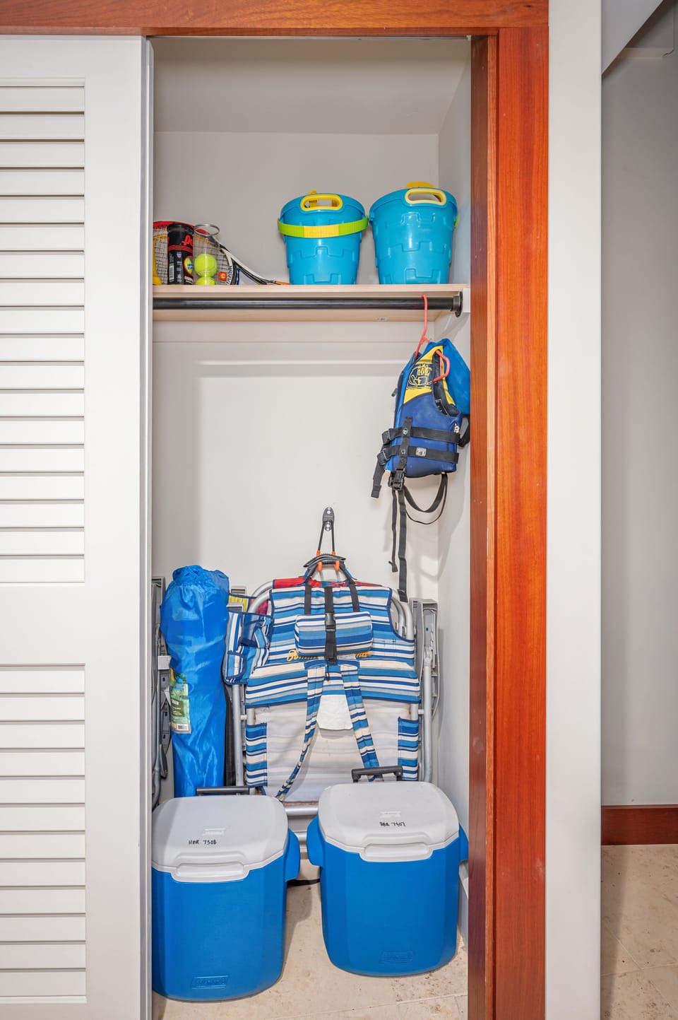 Beach essentials like chairs, umbrellas, and toys are ready for your island adventures.