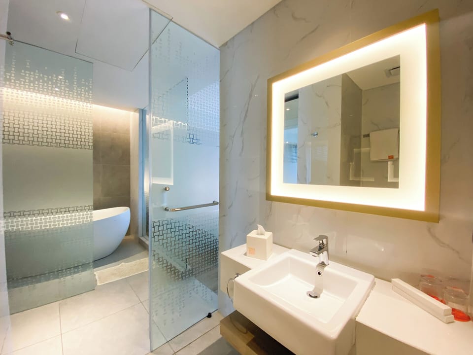Suite, 1 Bedroom | Bathroom | Shower, hair dryer, slippers, bidet