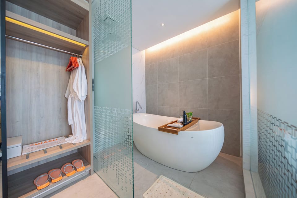 Suite, 1 Bedroom | Bathroom | Shower, hair dryer, slippers, bidet