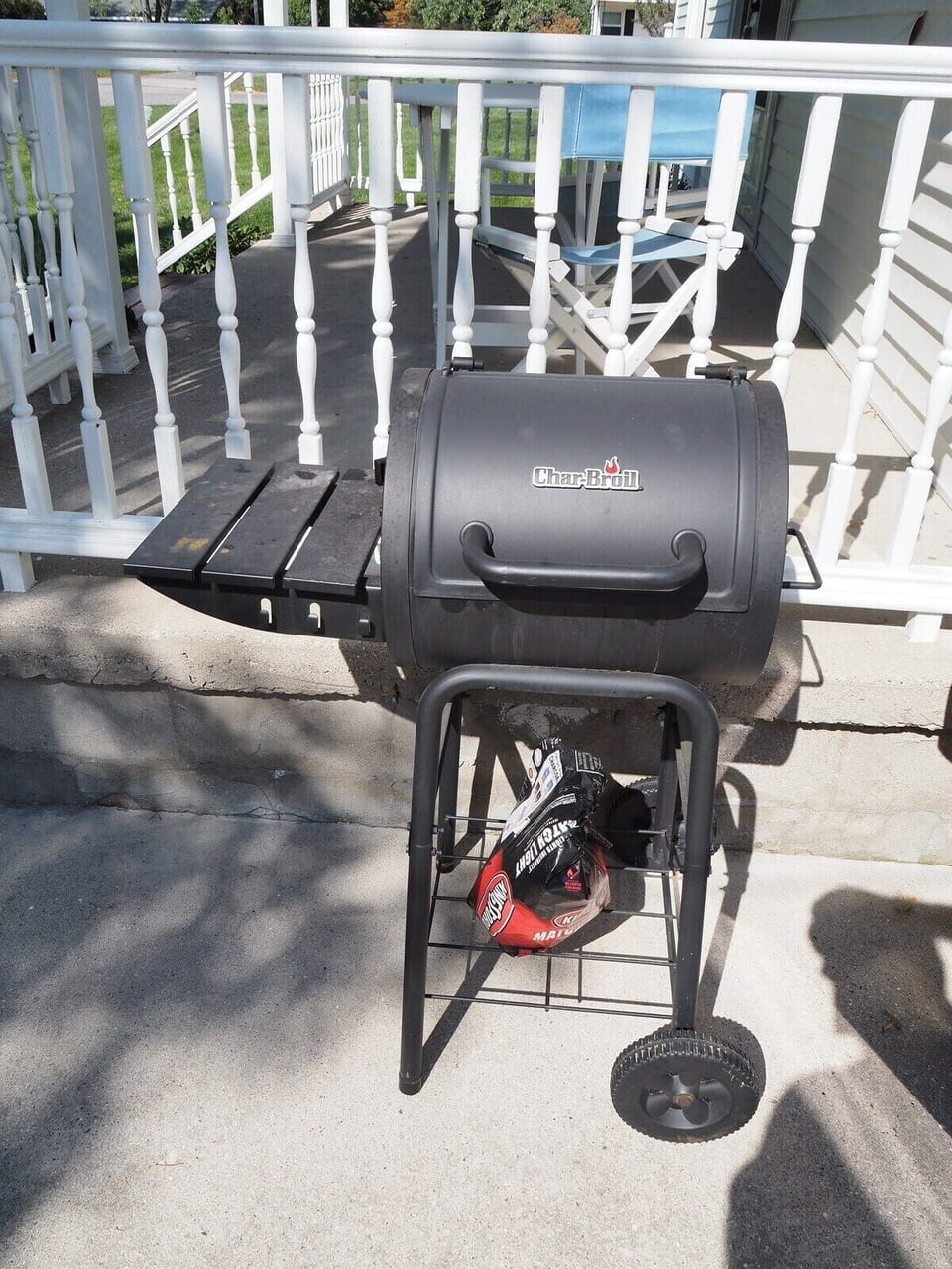 EXTERIOR:  The charcoal barbeque grill.