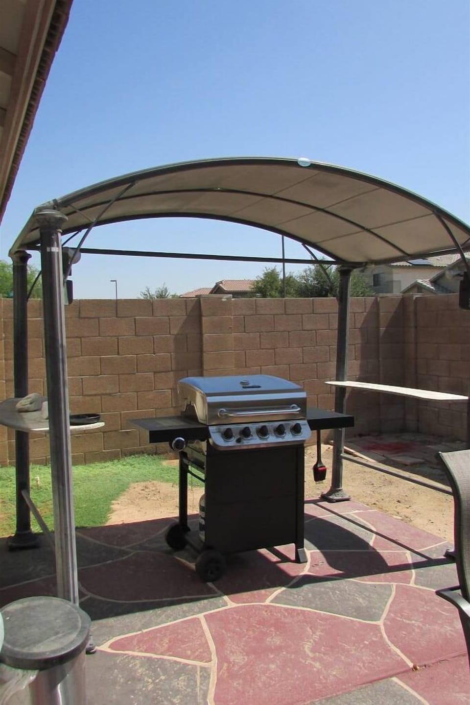 Private backyard with swimming pool, BBQ, and outdoor patio