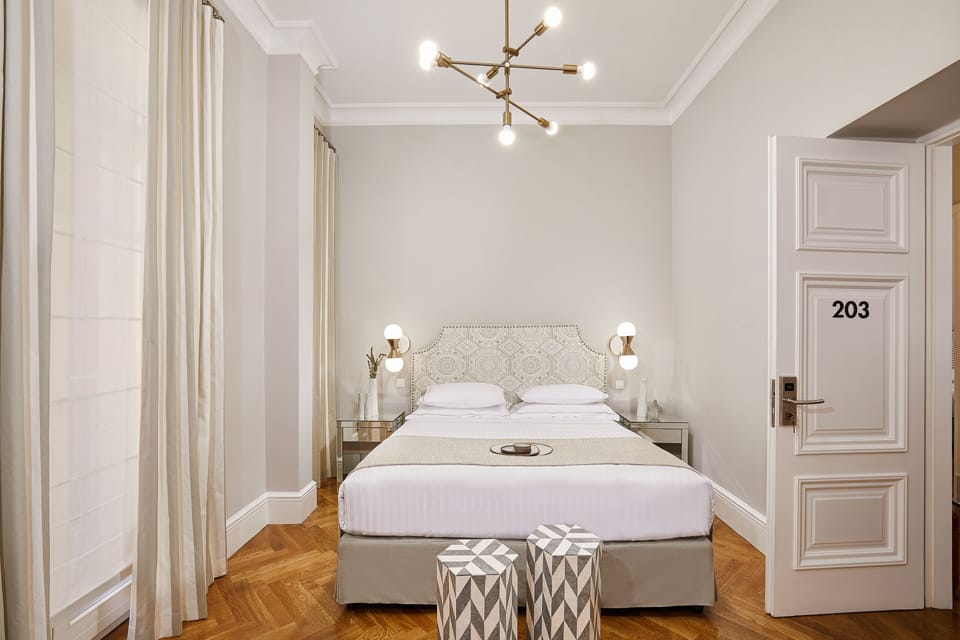 Deluxe Family Room with Balcony | Egyptian cotton sheets, premium bedding, memory foam beds, in-room safe