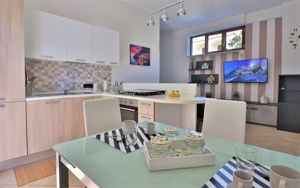 City Apartment, 2 Bedrooms | Private kitchen | Full-size fridge, oven, stovetop, cookware/dishes/utensils