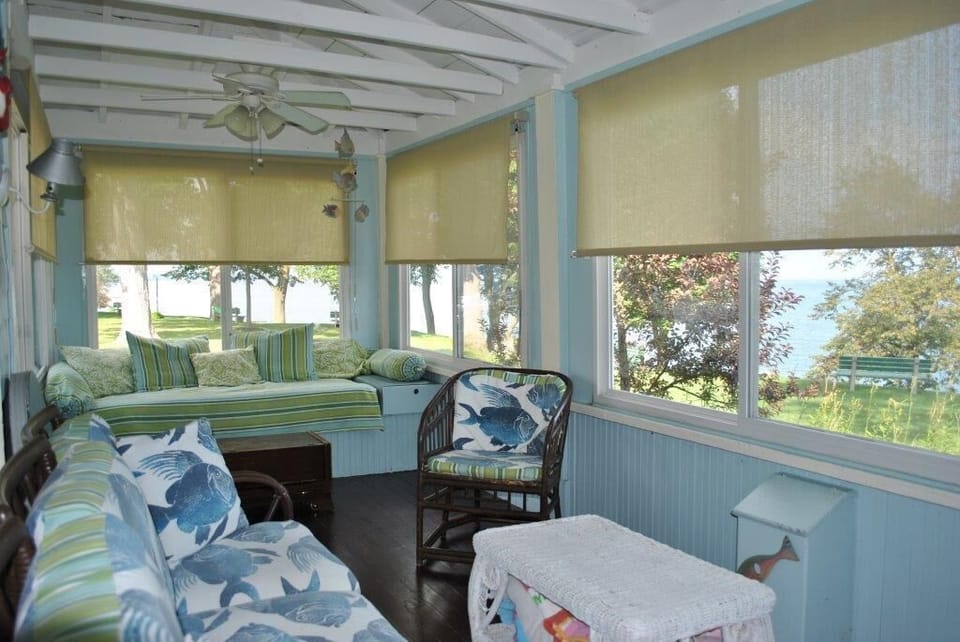 Enclosed porch overlooking Lake