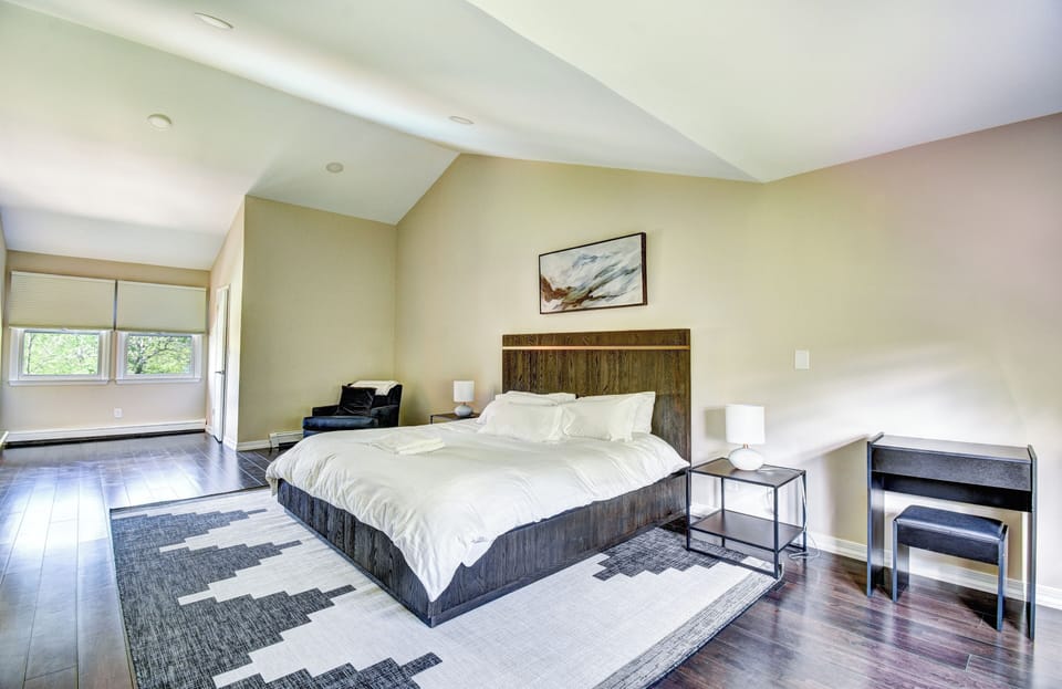 The primary BR with vaulted ceiling, private bath and walk-in closet!