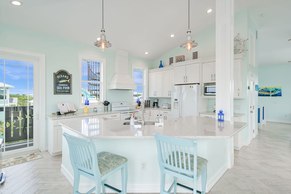 This bright, modern, well-stocked kitchen will be perfect for entertaining.