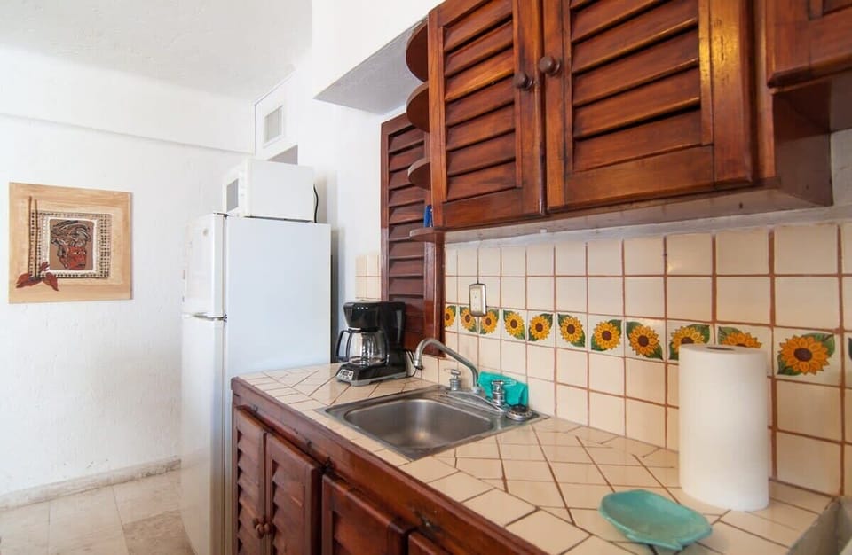 Small kitchen is fully equipped- cook in whenever you choose!