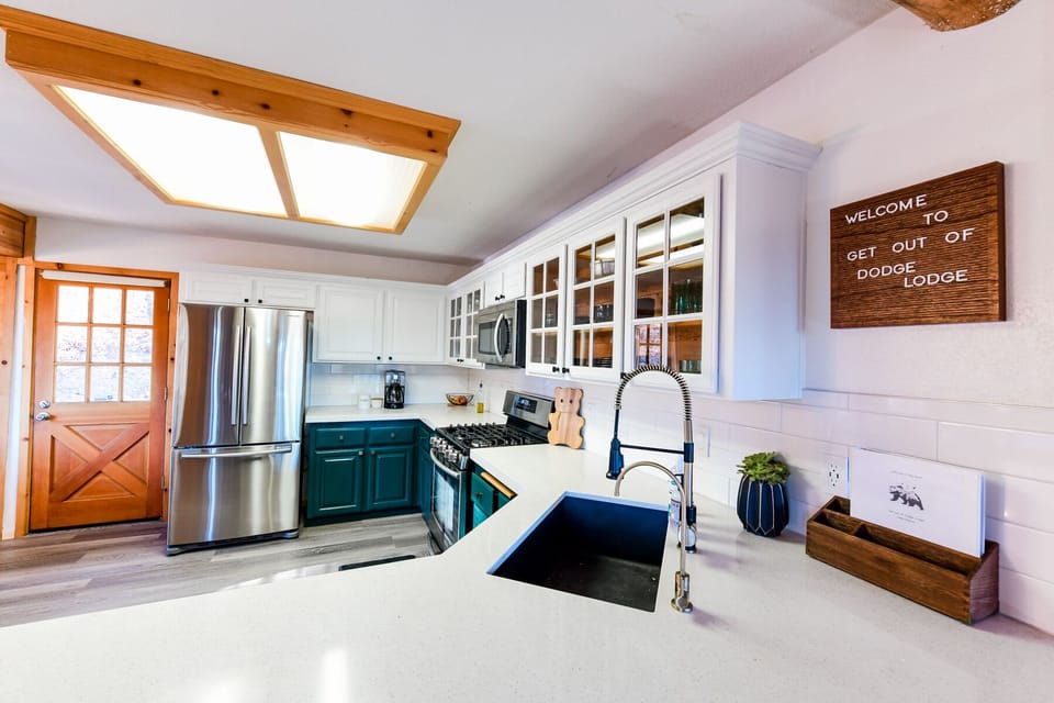 Modern and clean kitchen with all the supplies for a family dinner.