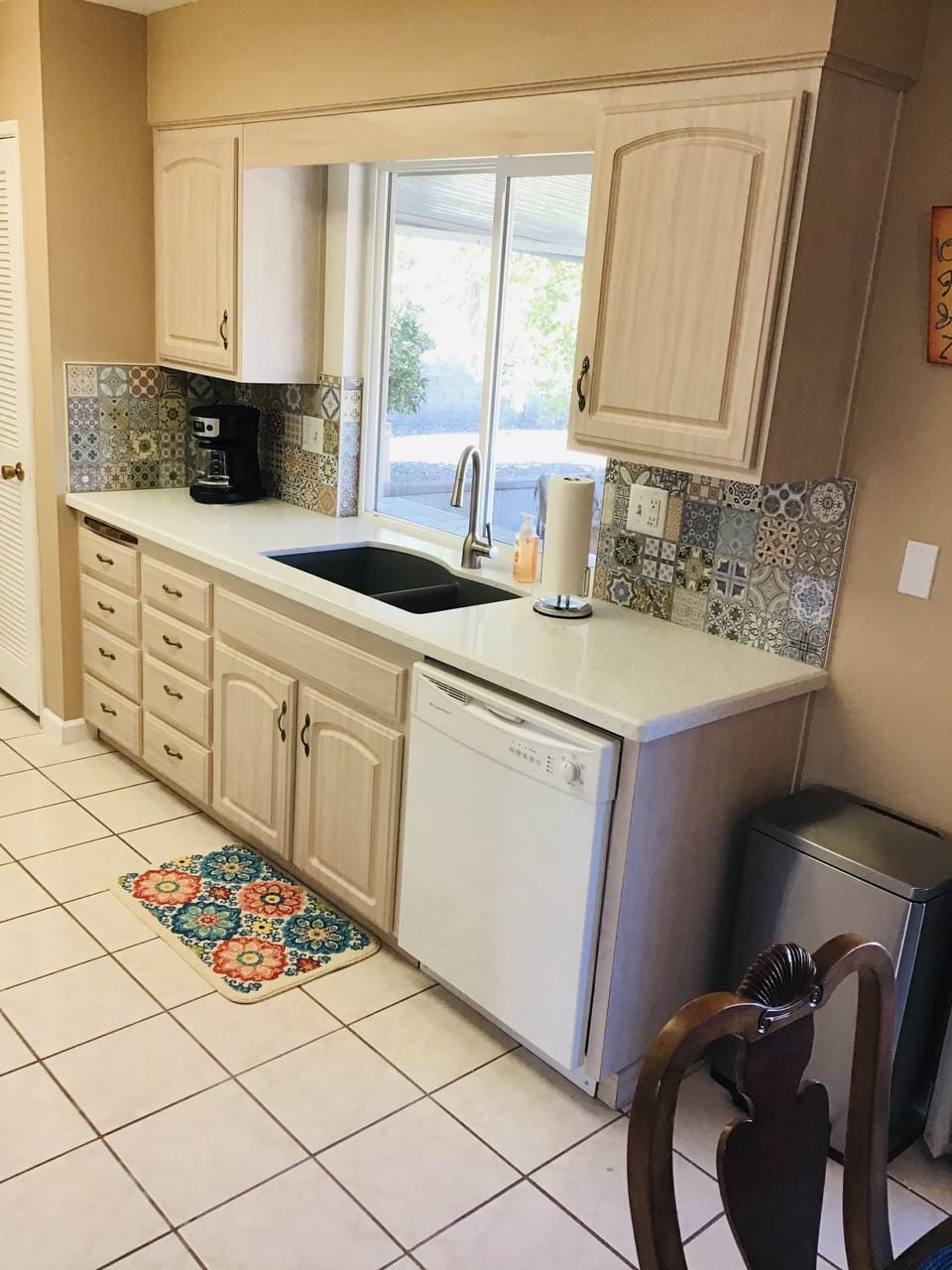Plenty of cabinet space, full of kitchen essentials