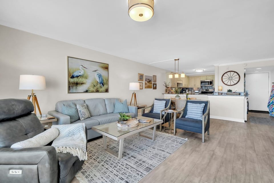 Your spacious living room flows seamlessly into the kitchen, creating the perfect space for relaxing and entertaining.