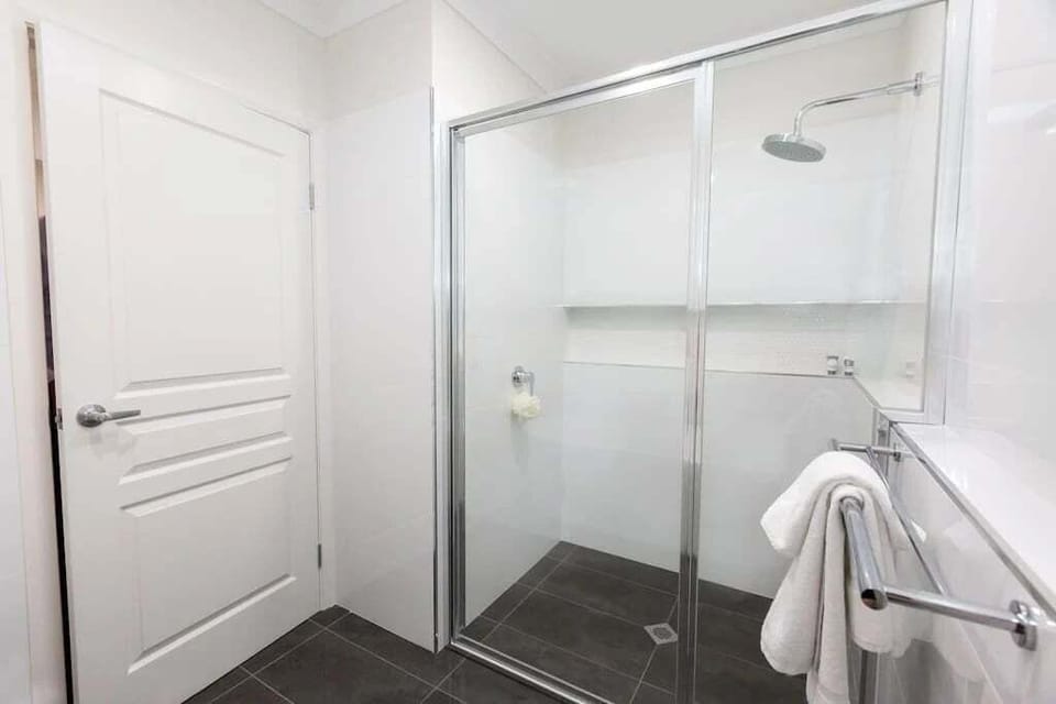 Ensuite bathroom with walk in shower.