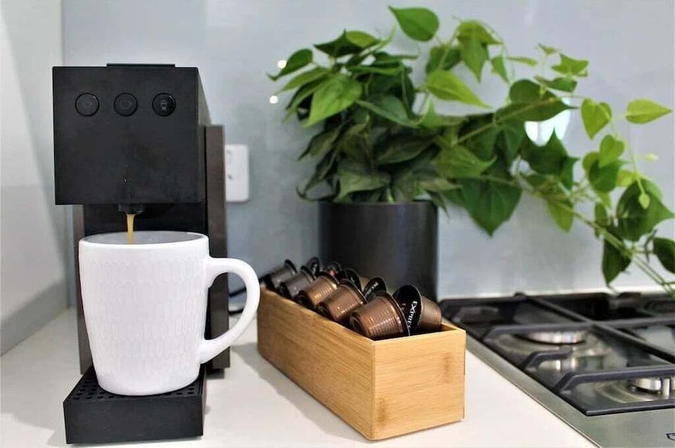 Coffee bar with Nespresso pods.