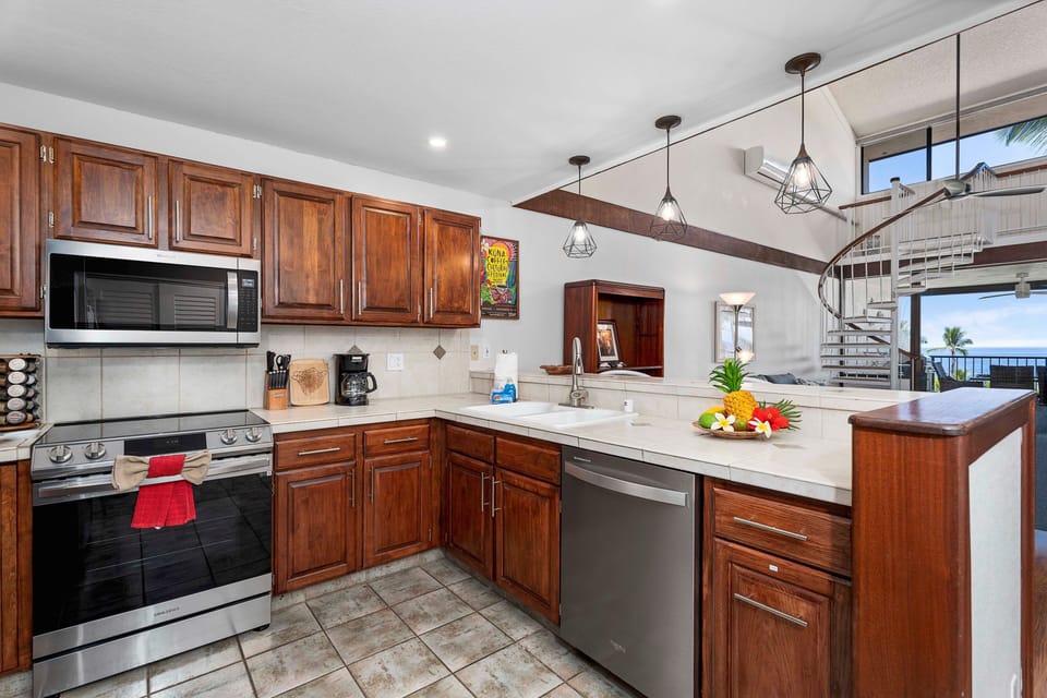 Well-equipped kitchen  with stainless steel appliances