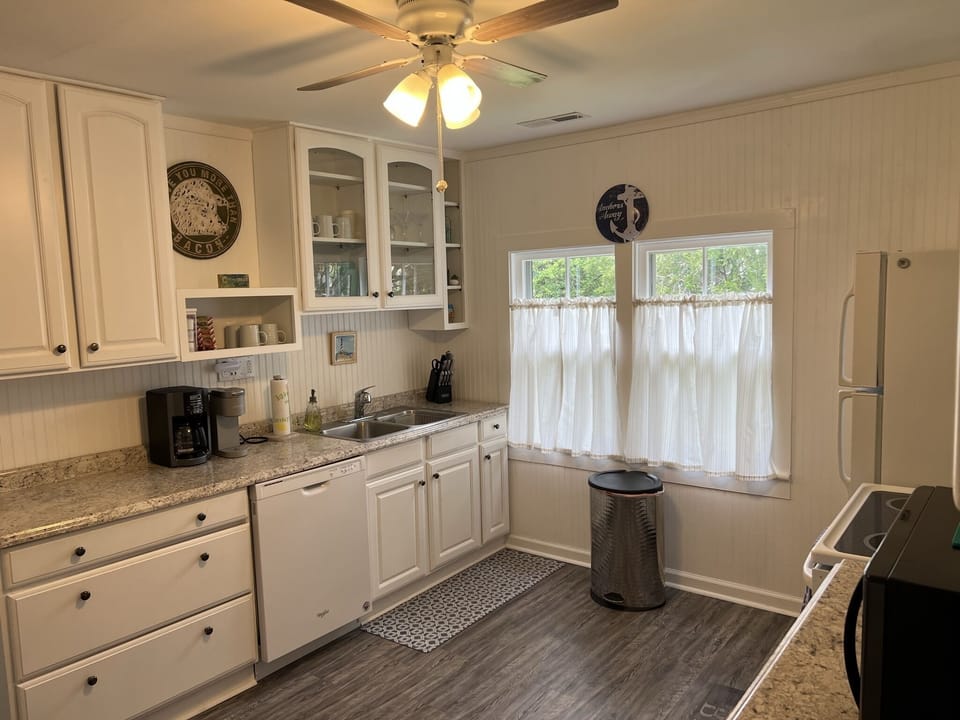Large kitchen with dishwasher, Keurig, Mr. Coffee maker