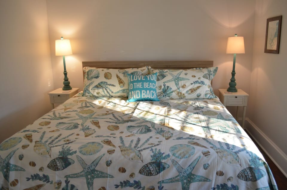 First-floor main bedroom with super comfortable king memory foam mattress