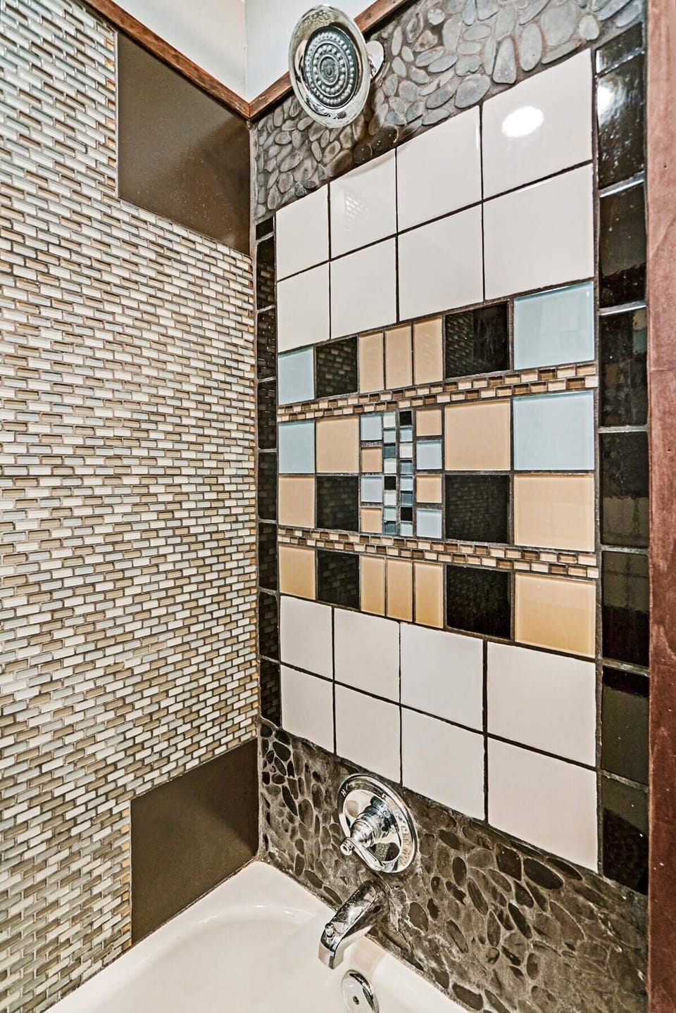 Second full guest bathroom with shower/tub combo and stunning tile work!