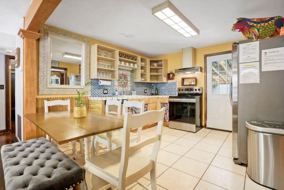 View of the dining area and kitchen.