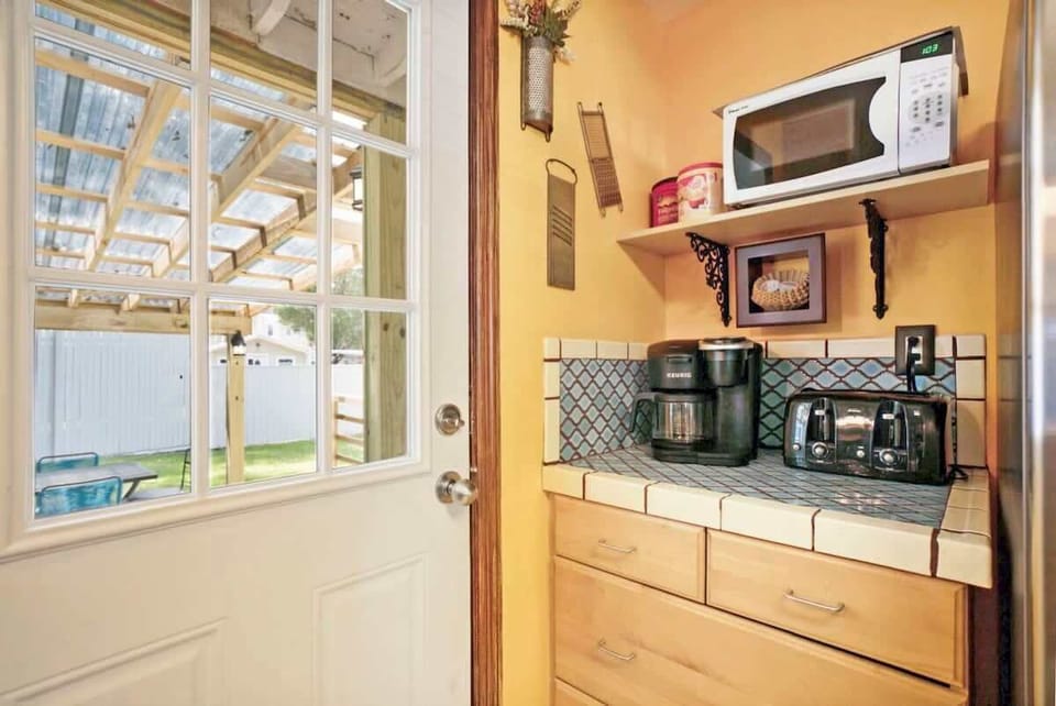 Coffee nook with toaster and microwave.