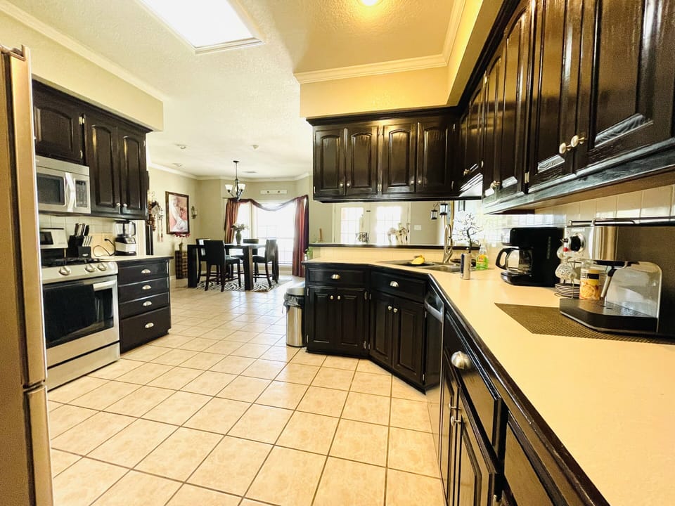 Well equipped kitchen lots of spices a Coffee pot with Folgers coffee much more!