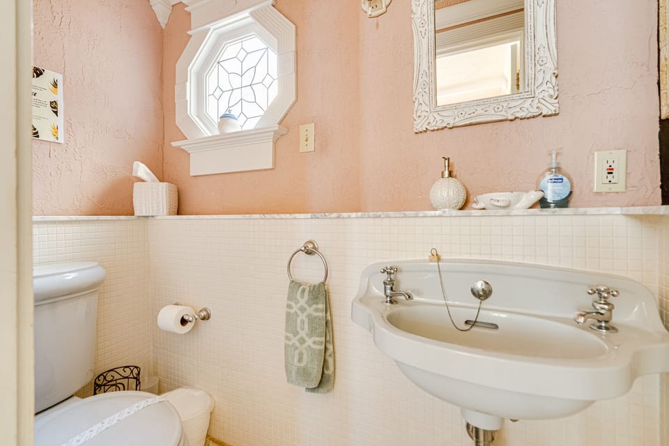 Half bathroom off the office/bedroom