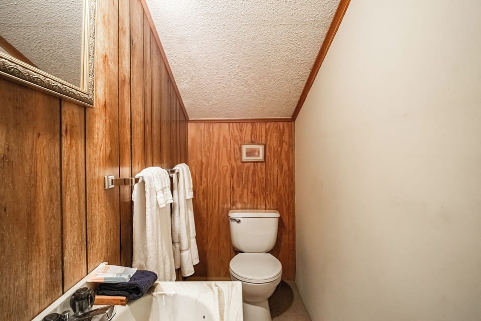 Shared half bath on the second floor for the twin bedroom and full bedroom.