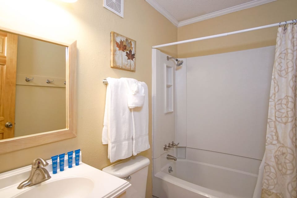 This is the shared bathroom located in the hallway. It has a tub/shower combo.