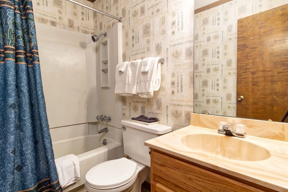 This is the shared bathroom located in the hallway. It has a tub/shower combo.