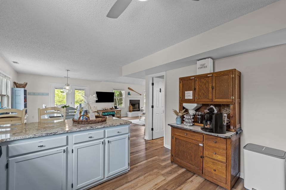 Your coffee bar is set in a 100 year old hoosier cabinet.