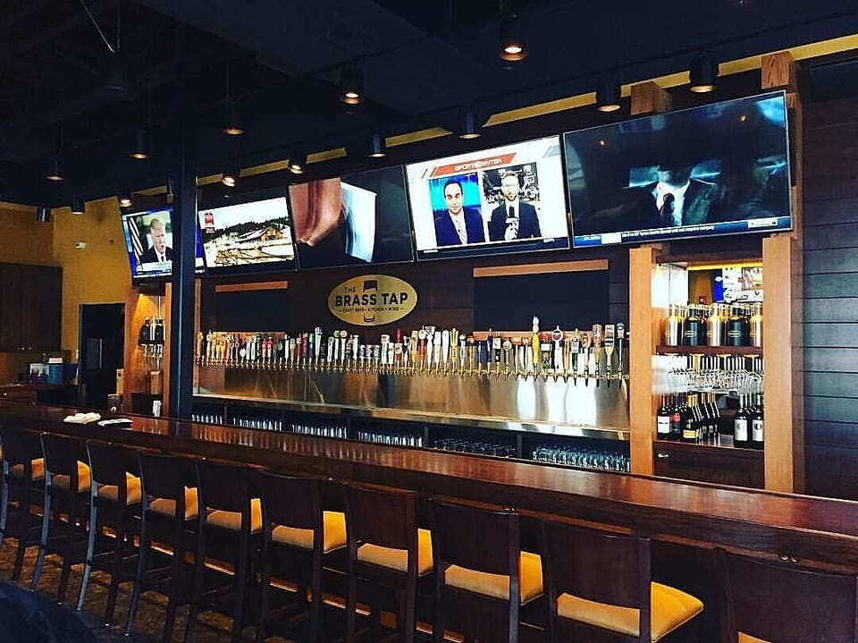 Popular Brass Tap so close its across the street.  Lovely patio with live music 