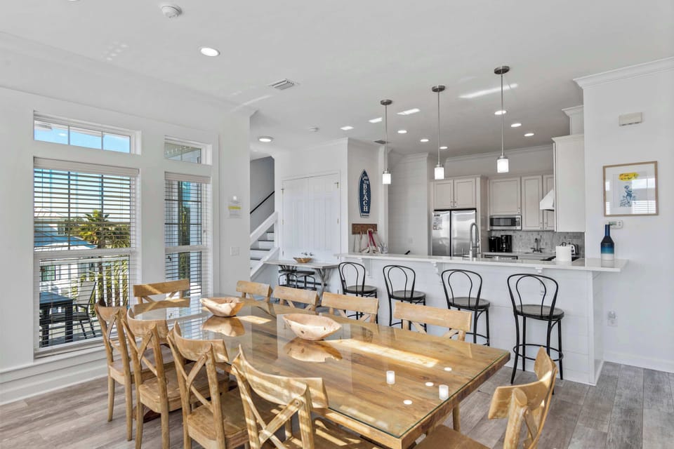 Open dining space flowing into the kitchen, designed for easy entertaining.