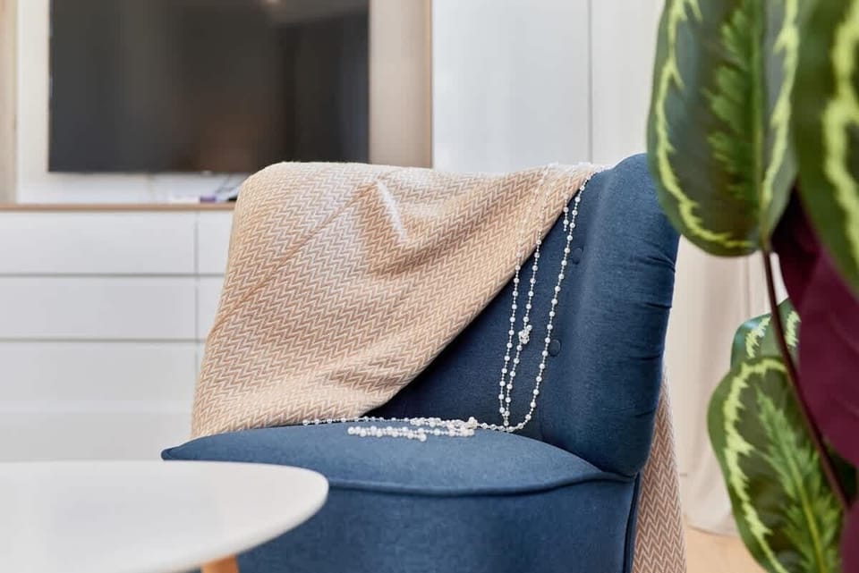 Stylish, navy blue armchair.