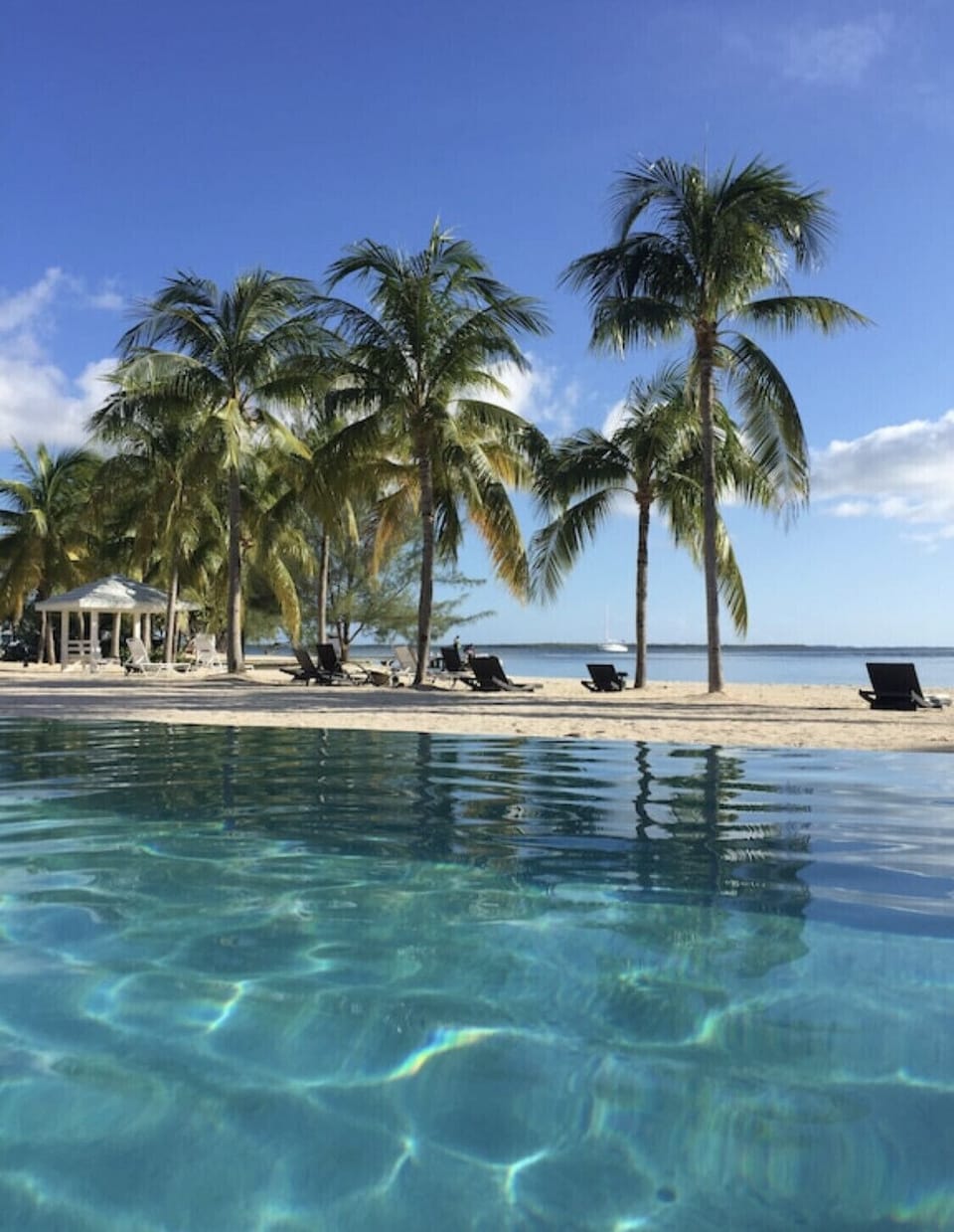 Our pool and hot tub overlook the gorgeous Caribbean Sea 