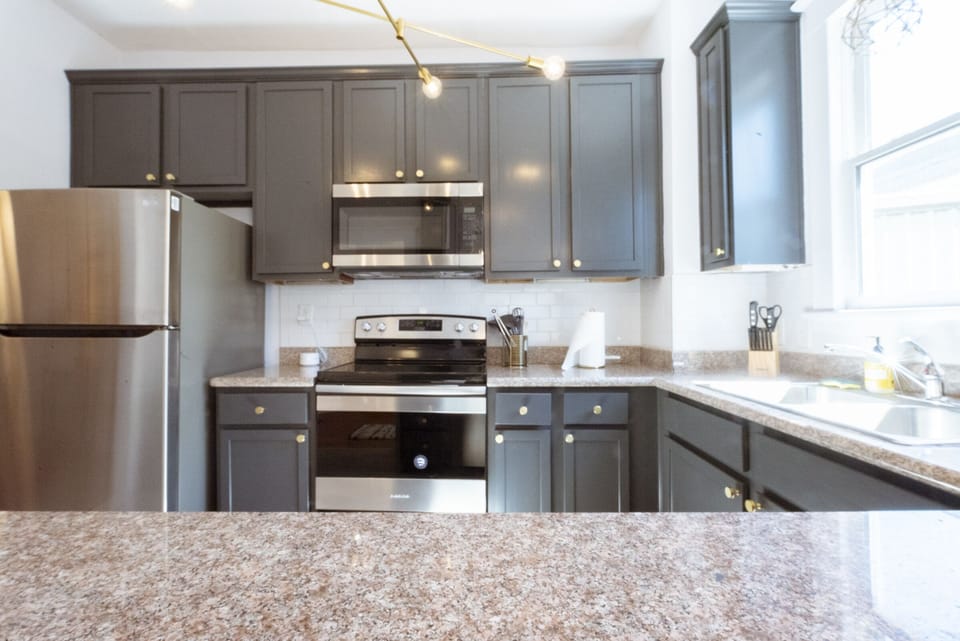 The well-appointed kitchen has the basic essentials for making yourself at home.