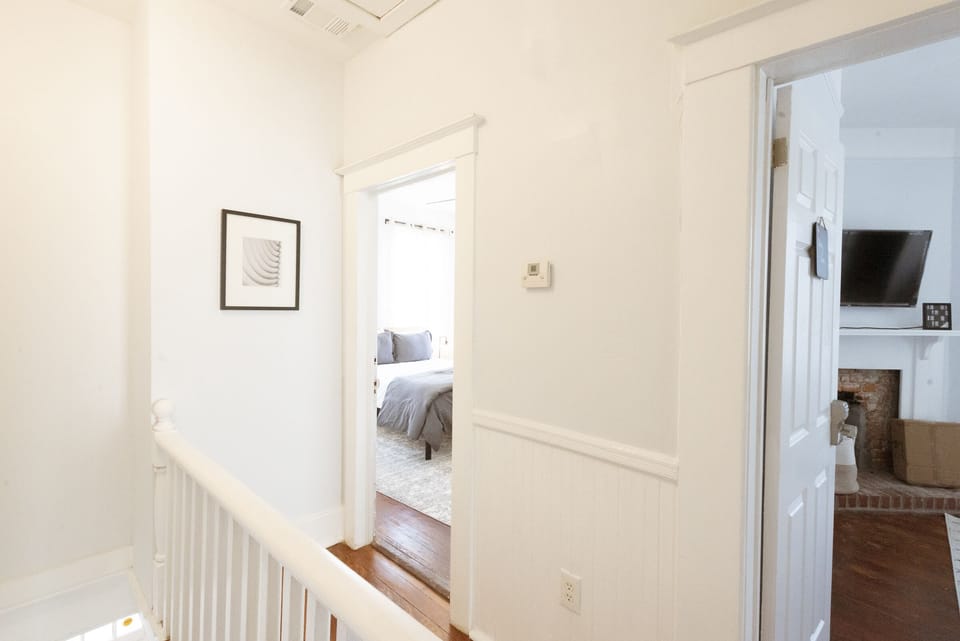 The bedrooms are upstairs, off the hallway.