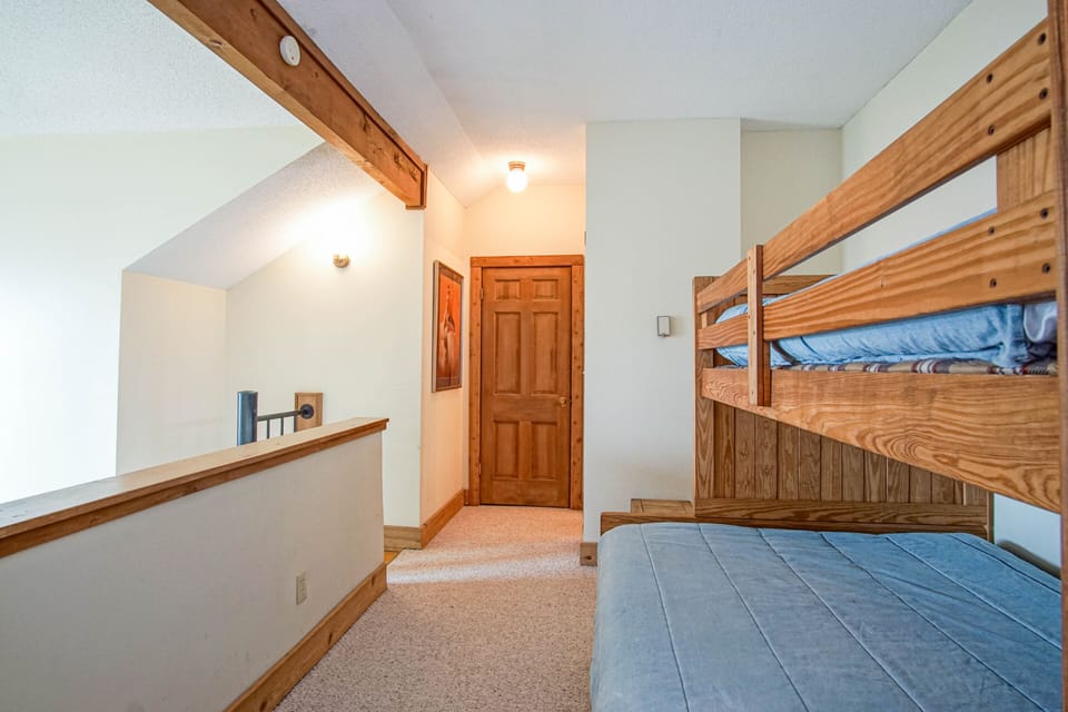 Set of bunk beds (twin over full) in loft