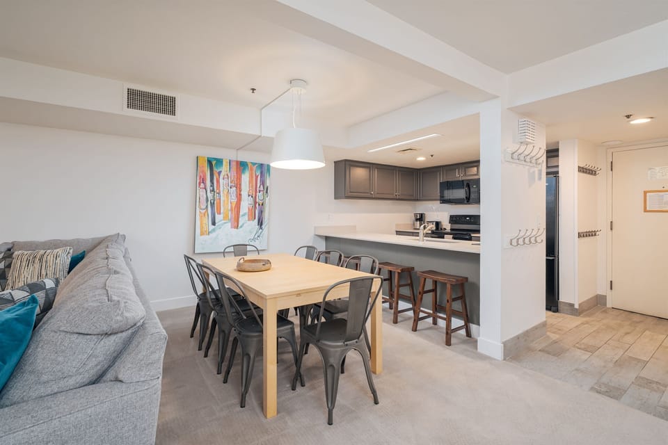 Large Dining Table next to Kitchen & Entrance