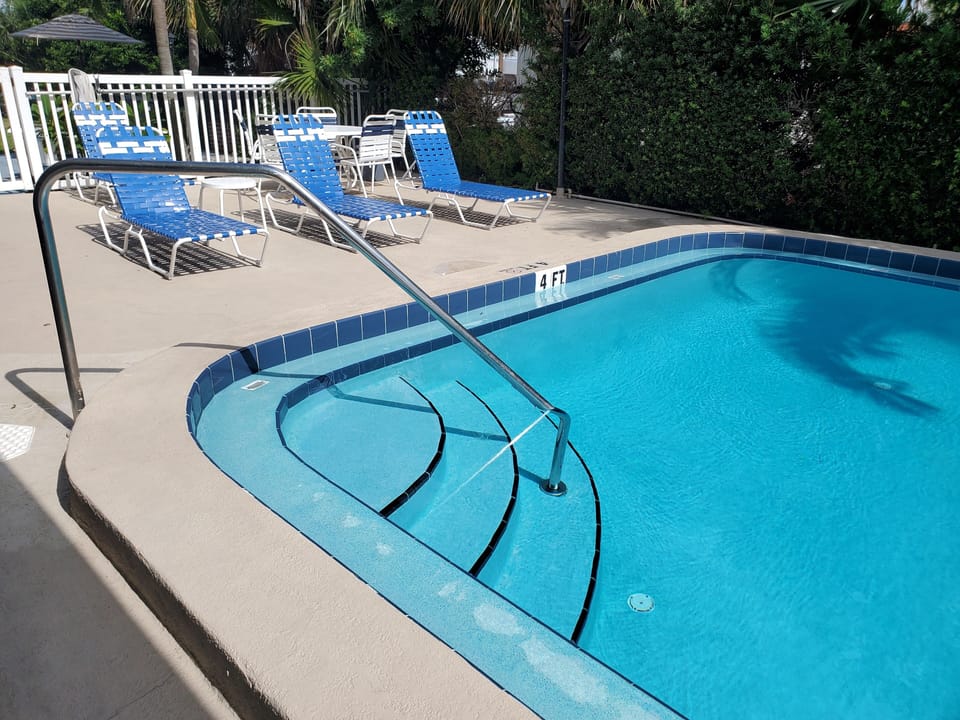 Pool steps into 4.5 ft on this end, 6.5 ft on other end.