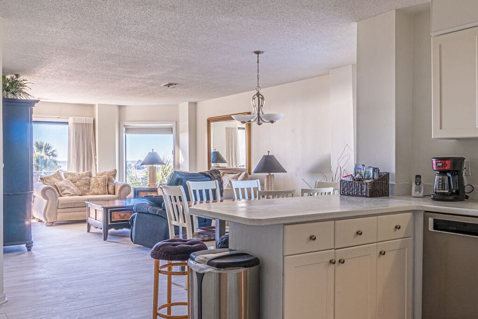 kitchen opens up to the living room