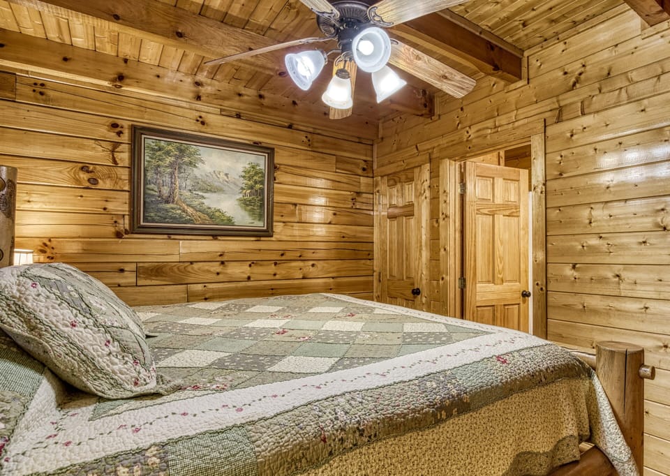 Log Cabin on the River in the Smokies - River Livin - Main level bedroom 2 with queen size bed