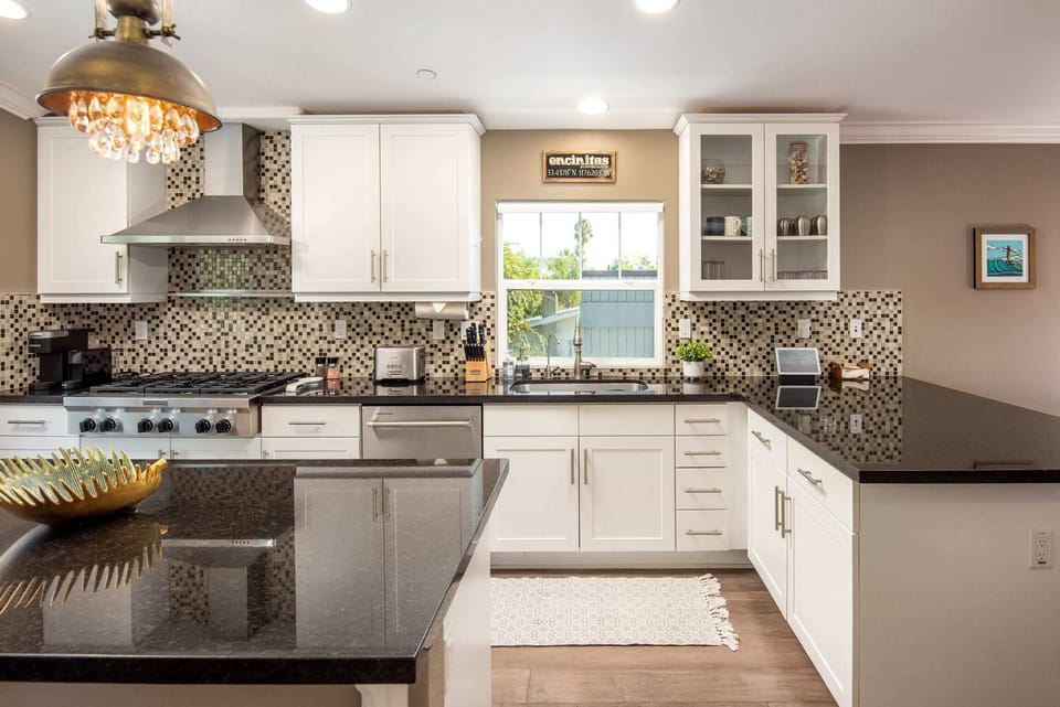 Natural daylight floods the spacious kitchen making food preparations all the more enjoyable.