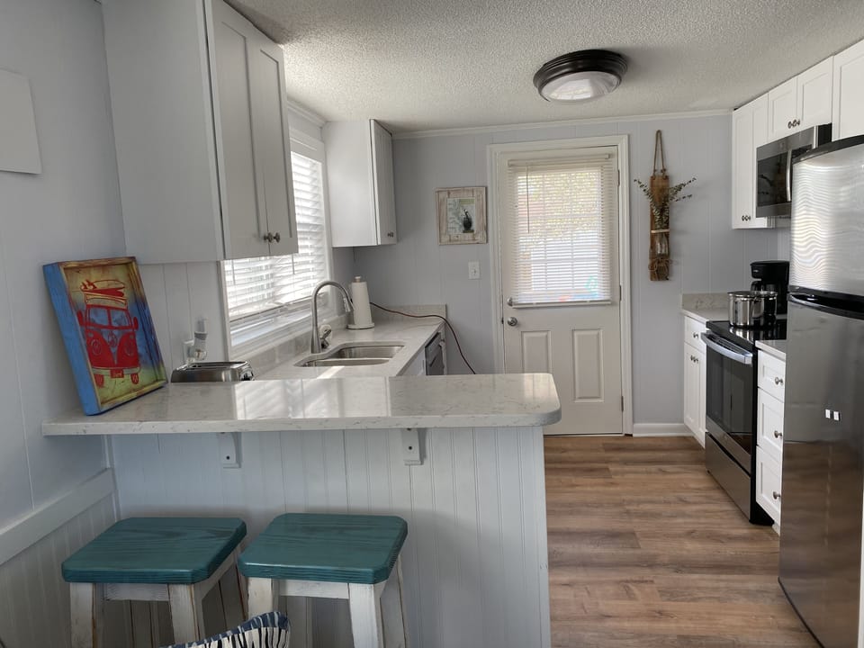 Newly Renovated Kitchen Area with everything you will need.